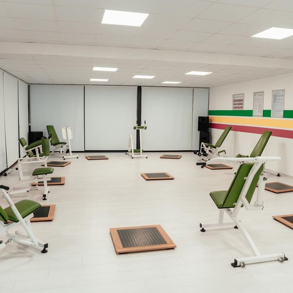 Empty clean workout space with soft purple ambient lighting.