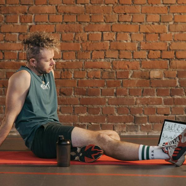 Person's hands resting after a completed cardio exercise session.