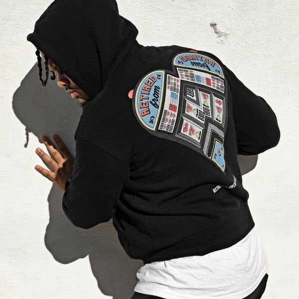 Shadow of a person moving rhythmically against a dark wall.